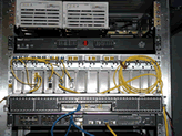 Movaz RAYexpress unit (rear view) rack mounted and connected with three 2.4 Gbps wavelengths multiplexed onto the optical fiber connecting GSFC and UMCP